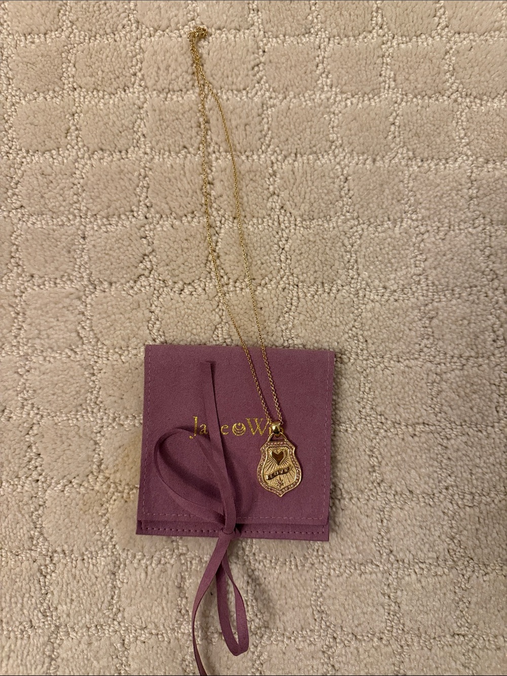 Jane Win love shield on classic rolo chain